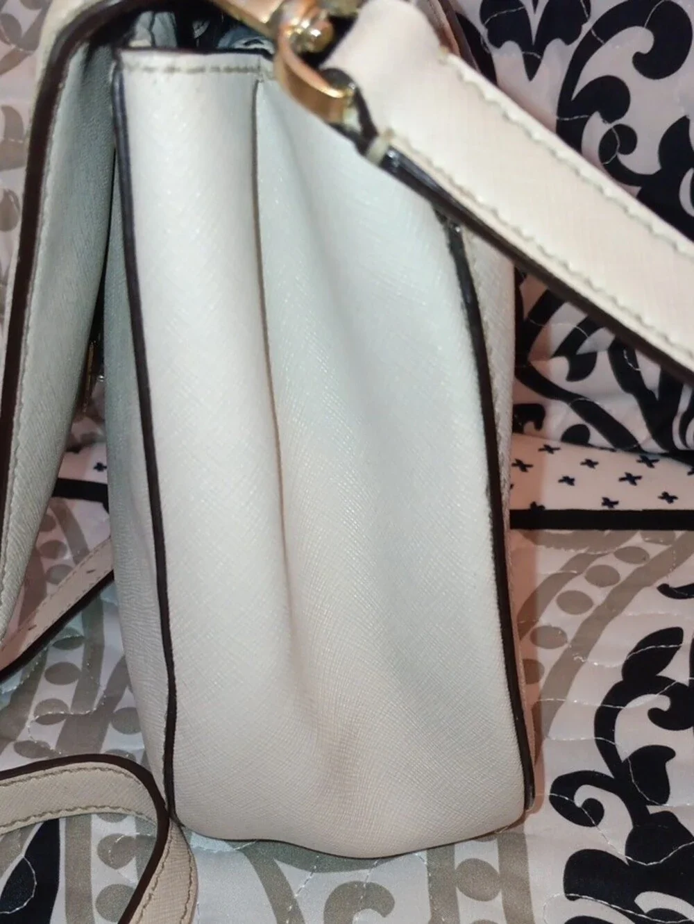 kate spade cream saddle crossbody with gold-tone logo